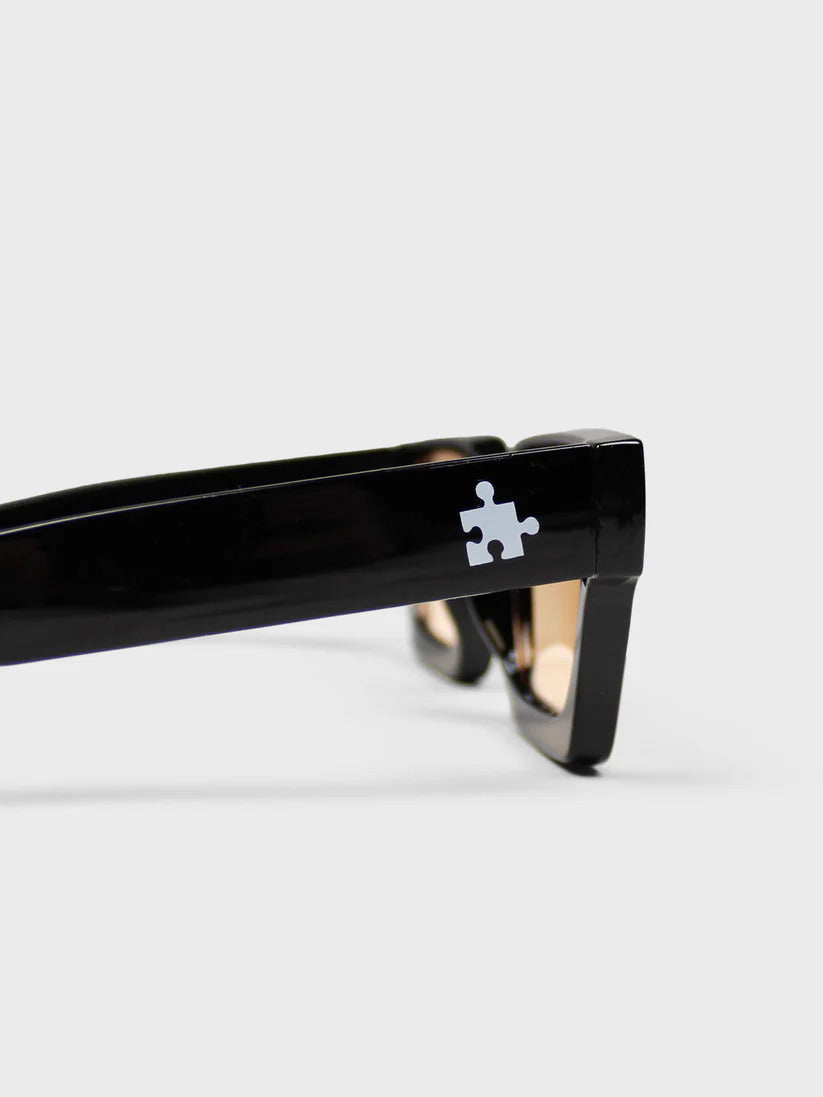 The Missing Piece Shades by Ricks Classic | Black/Champagne