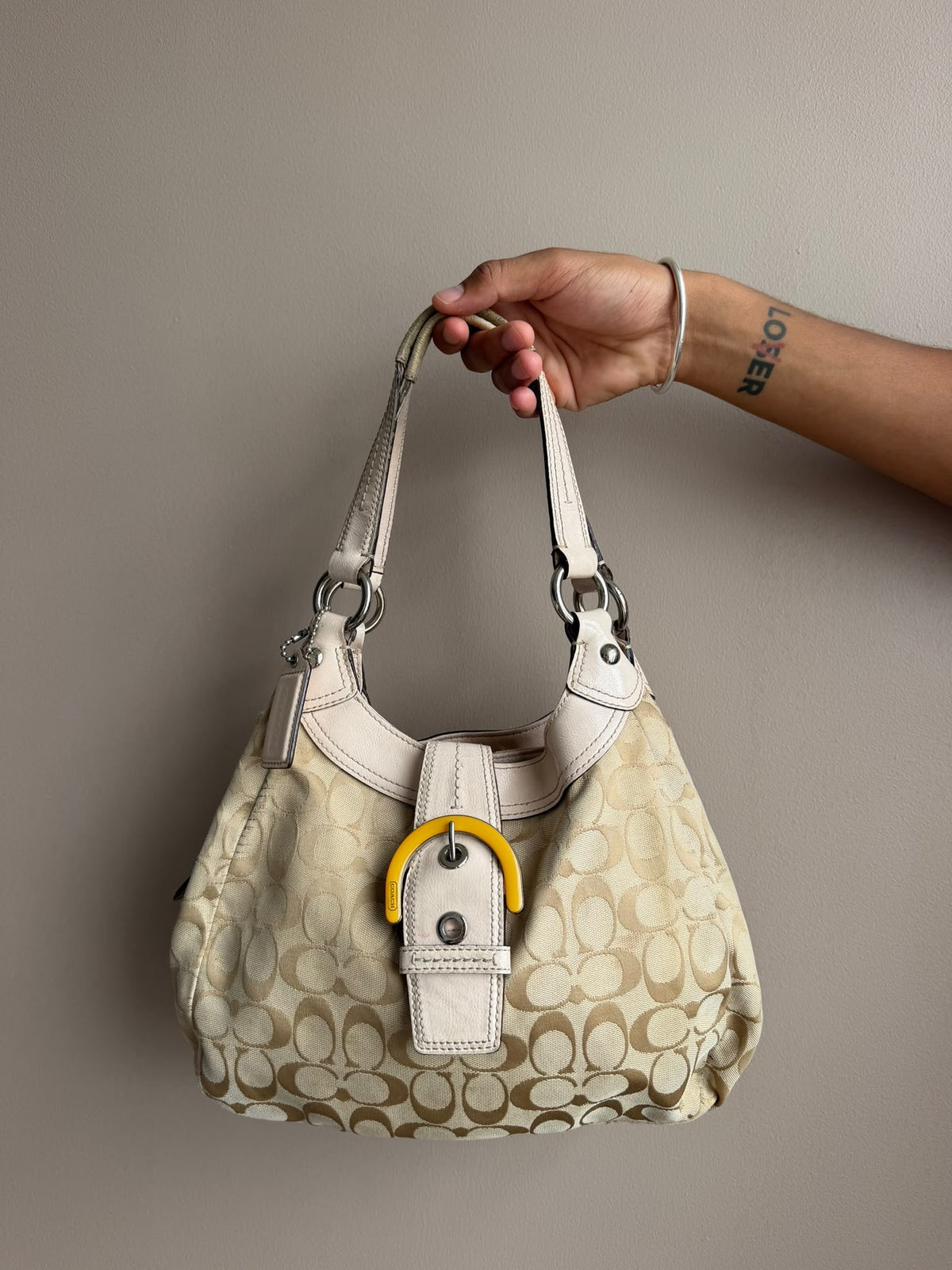 White Signature Coach Buckle Bag